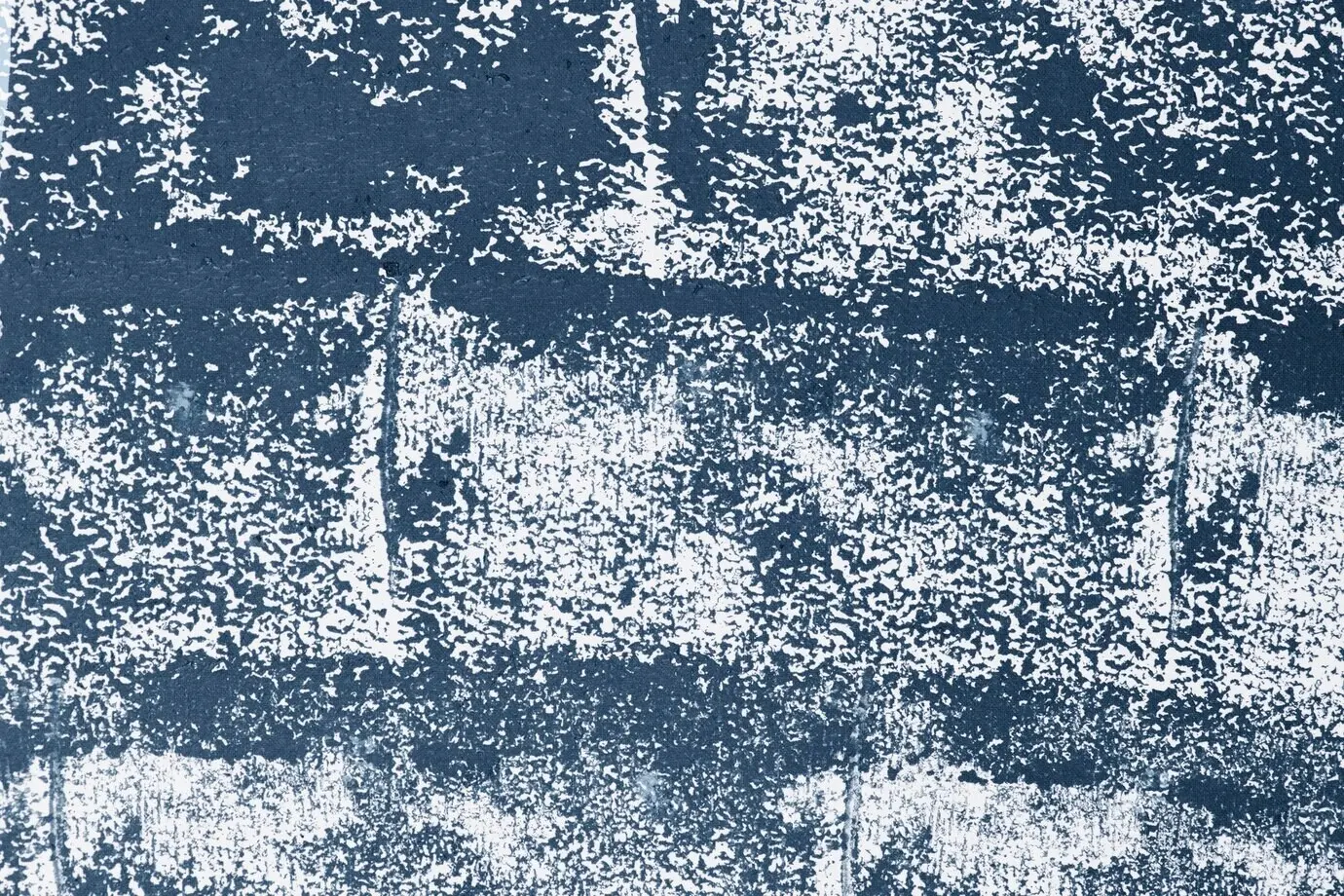 Синий фактурный шероховатый фон с блочными принтами на ткани